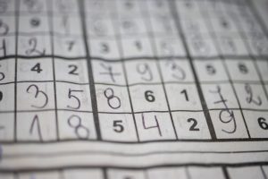 solved sudoku puzzle in a newspaper
